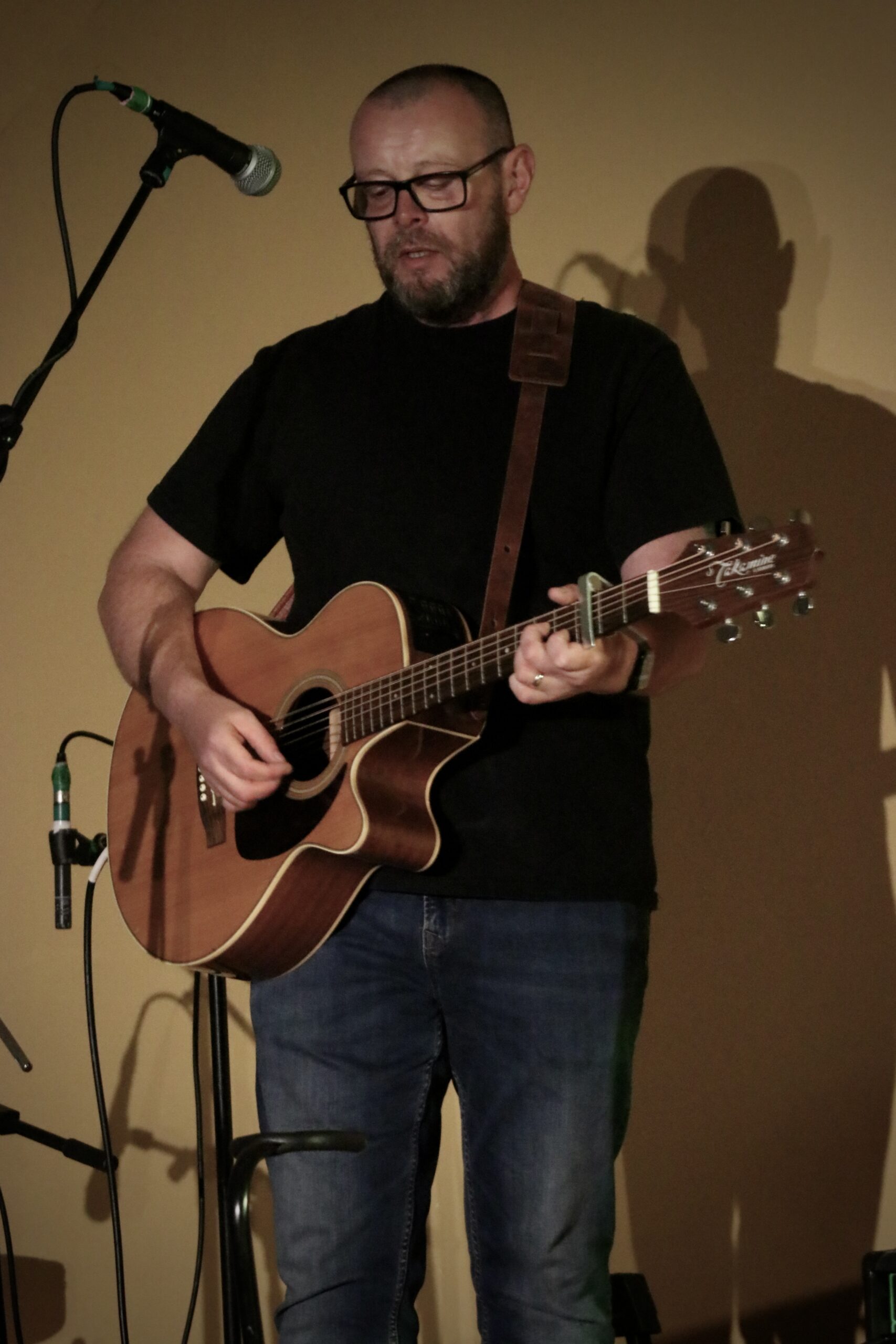 Chris Mackinnon on guitar