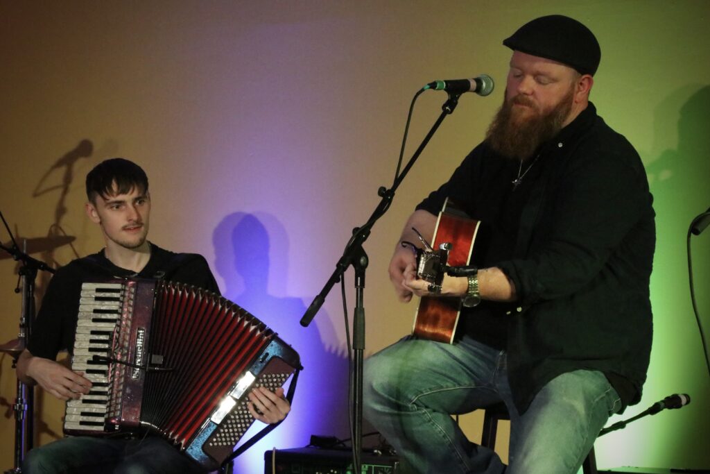 John Condron on guitar and Angus accordion at BayFest 2026
